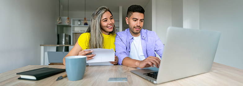 Couple looking at computer