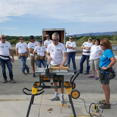 Volunteers helping with manual labor