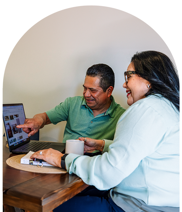 Couple looking at laptop