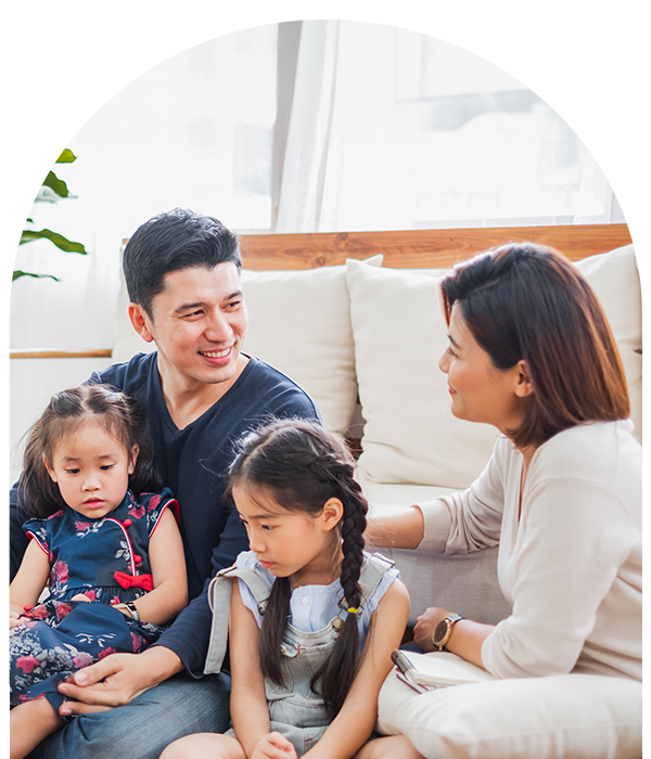 Family laughing in home